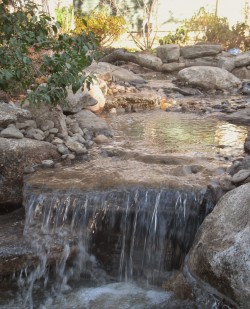 A big rock created a big splash into this Newton pond