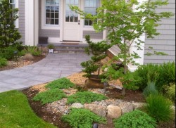 A Japanese garden graces this Needham, MA front entry 