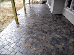 A Belgard pavers patio transforms an underdeck space into a functional patio