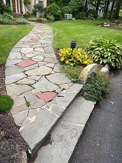 Front walkway (before). Flagstones set in cement